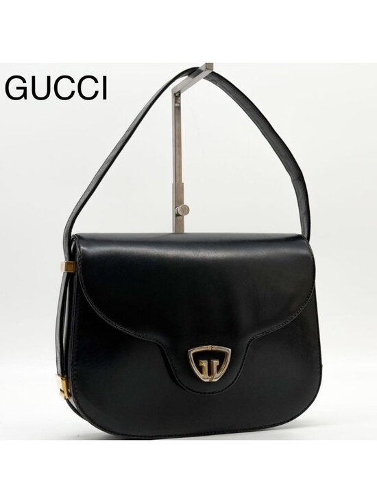 Gucci Handbags - Gucci Vintage Handbag Black GG Interlocking